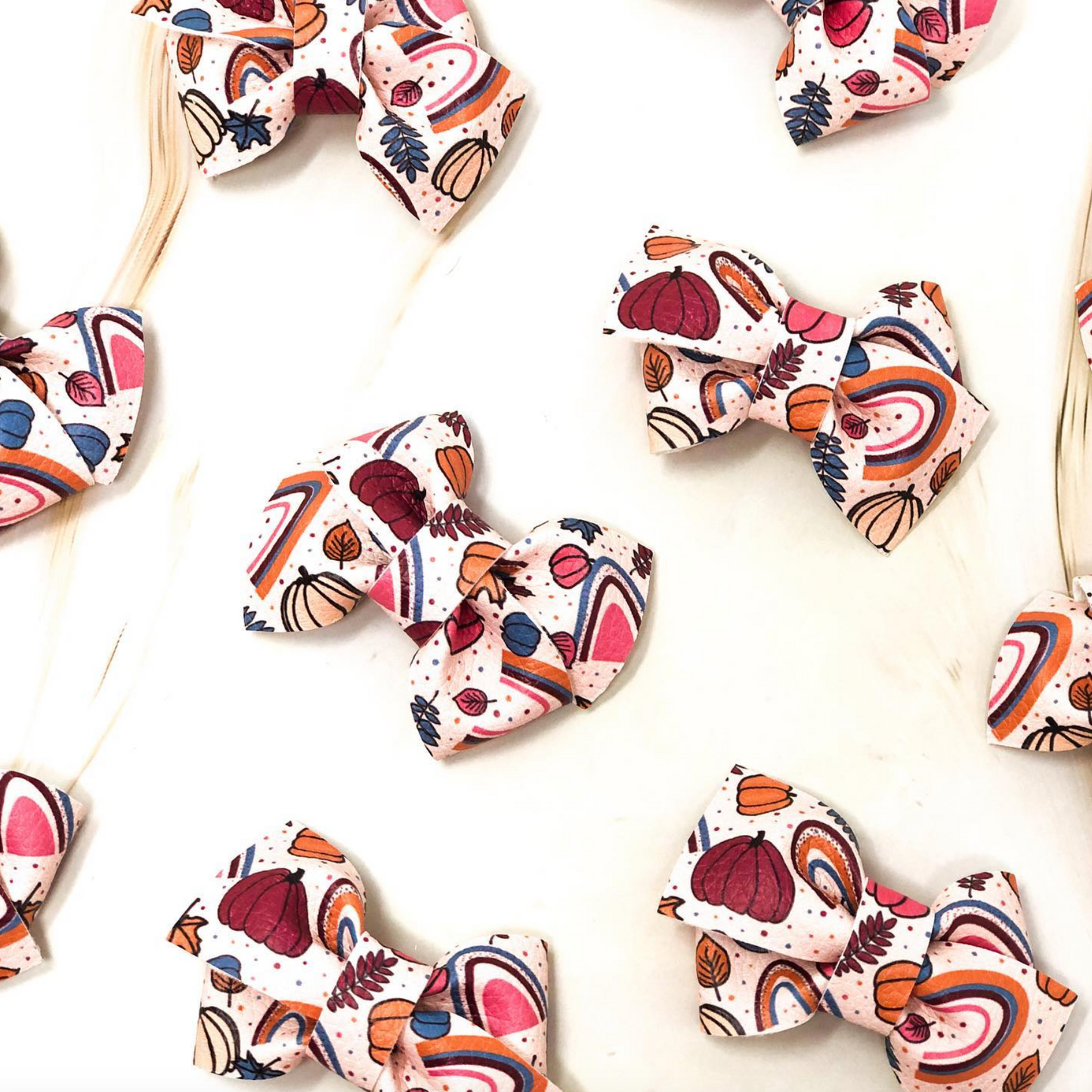 Handmade vegan leather hair bow in fall colors