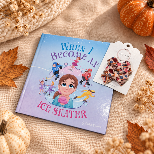 When I Become an Ice Skater by Caitlin Bowers with pumpkin floral rainbow pigtail bows on cream linen, surrounded by pumpkins and autumn leaves.