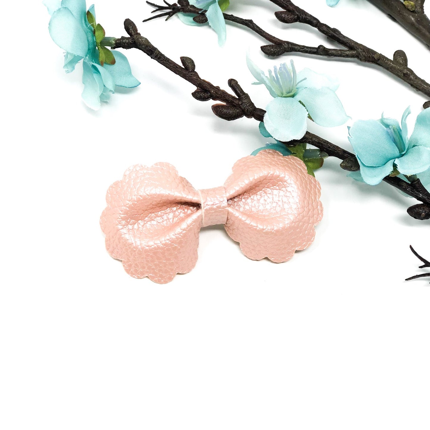 Ruffle Bloom Bow Collection handmade ruffle flower hair bows in coral pink, dusty blue, and spring zigzag pattern